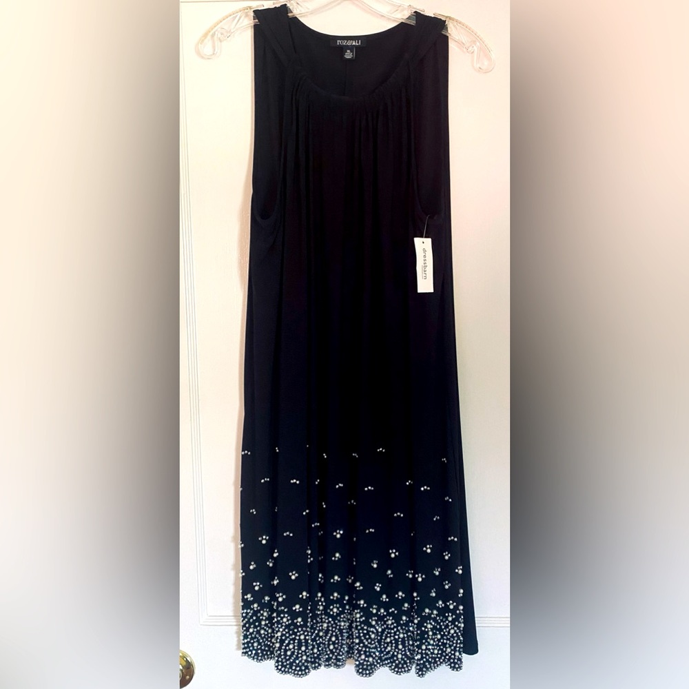 Black cocktail dress with pearl and crystal details. New with tags! XL